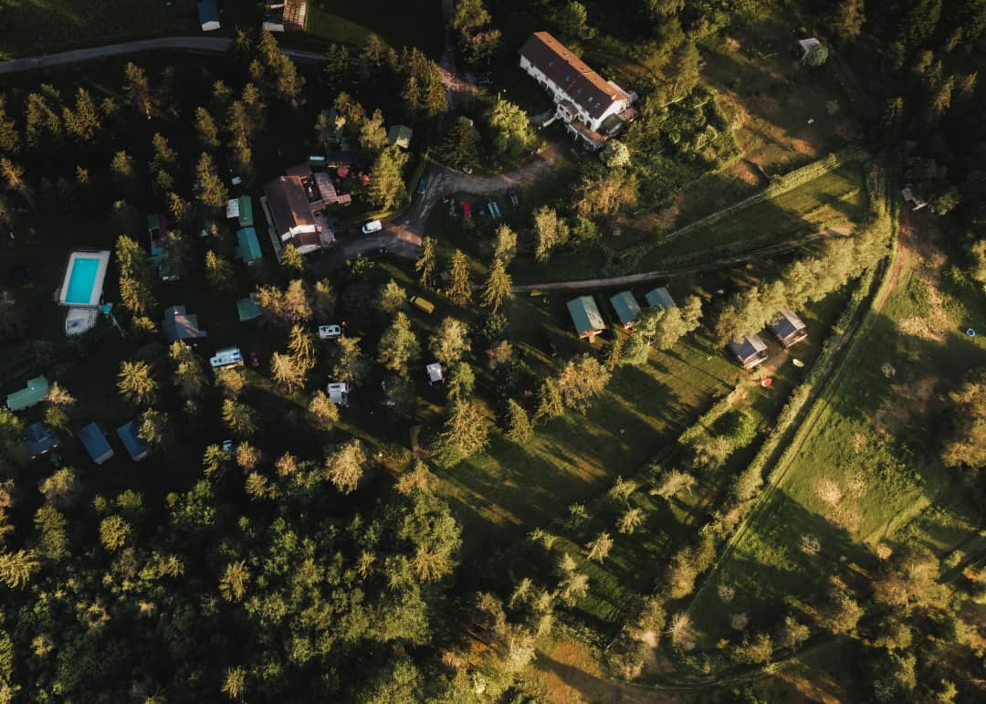Aerial view of the campsite set amongst the woods